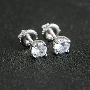 Macro shot of S925 sterling silver stud earrings with 4-prong set zircon and screw back