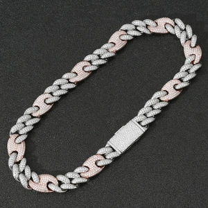 Detail of 20mm two-tone hip hop cuban link necklace with iced out coffee bean mariner clasp