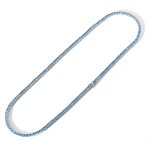 Close-up of 4mm tennis chain featuring sky blue cubic zirconia in polished silver setting