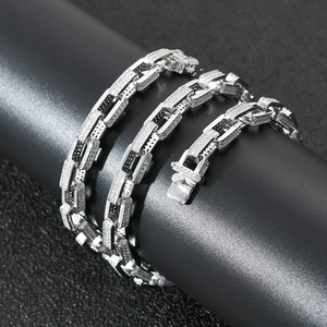 Detail of silver-colored hip-hop box chain necklace with micro-pave cubic zirconia