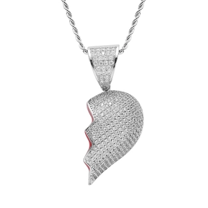 Detail of hip hop heart pendant with zircon pavé setting and red enamel accents