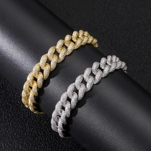 Hip hop style 12mm iced out Cuban link bracelet in gold and silver finish with zircons