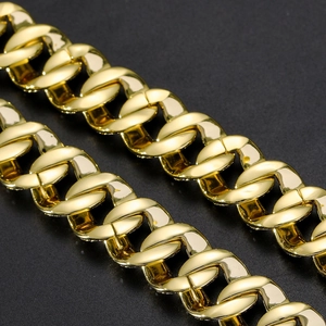 Iced out 12mm Cuban link chain in golden finish with micro paved zircon stones