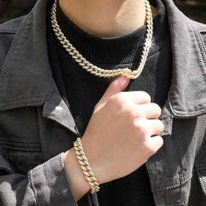 Men's 12mm iced out gold Cuban link chain necklace and bracelet set with micro pave zircons