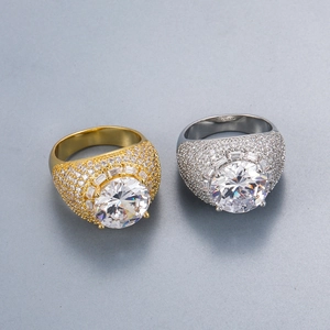 Hip hop ring set in gold and silver finish with large round center zircon and micro pavé