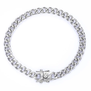 Detailed macro view of silver Cuban chain necklace with secure double-lock safety clasp