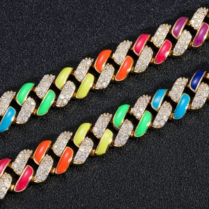 Detail of 12mm rainbow Cuban link bracelet with multicolored enamel and zircon stones