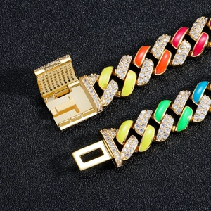 Close-up of 12mm rainbow cuban link chain with colorful enamel and pavé zircon stones