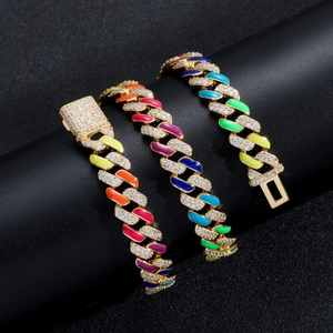 Detail view of 12mm rainbow Cuban link bracelet with colorful enamel and zircon settings