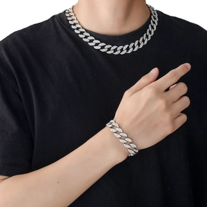 Close-up of hip-hop men's 15mm iced out silver cuban link chain and bracelet set