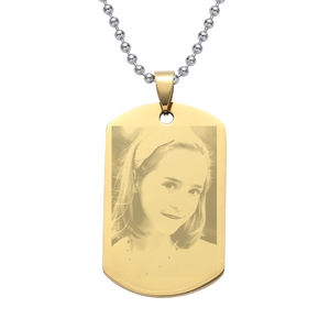 Close-up of gold military dog tag pendant with custom laser-engraved portrait on ball chain