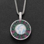 Close-up of hip-hop pendant with map design and colorful gemstones on silver chain