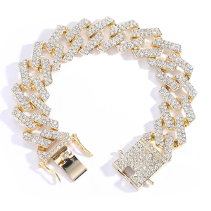 Detail of 19mm gold-plated cuban link chain with secure box clasp and iced out zircon stones