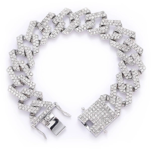 Close-up of 19mm silver Cuban link bracelet with iced-out pavé zircons and secure clasp