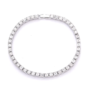 Detailed view of silver tennis bracelet with brilliant round-cut cubic zirconia crystals