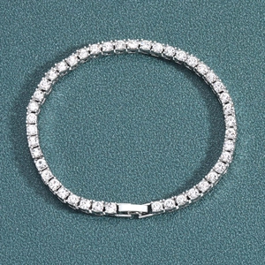 Classic silver-tone tennis bracelet featuring a single row of sparkling round zircons