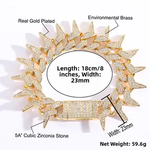 Detail of 23mm spiked Cuban link bracelet in 18K gold plated brass with 5A+ zircon stones