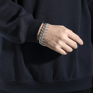 Iced out silver tone spiked Cuban chain bracelet for men with micro paved zircons