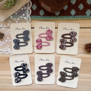 Lot de 12 pinces à cheveux avec nœuds, pois et motifs floraux pour filles