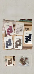 Lot de barrettes à nœuds à pois en tissu avec détails du clip métallique à l'arrière