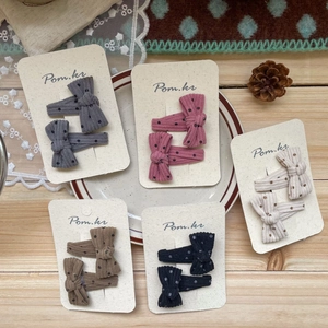 Cinq paires de barrettes à nœud en velours côtelé à pois de diverses couleurs pour filles
