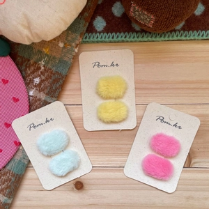 Sweet plush oval hair clips set in mint green, soft yellow, and pink colors for girls