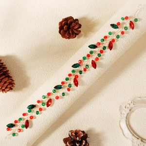 Serre-tête de Noël étincelant avec strass rouges et verts et fil métallique doré tressé