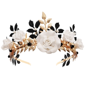 Gothic floral headpiece with white resin roses, black leaves and gold metal branch crown