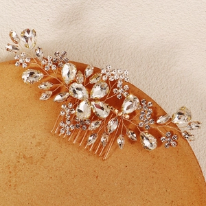 Peigne à cheveux de mariée doré élégant avec strass brillants et accents de gouttes d'eau