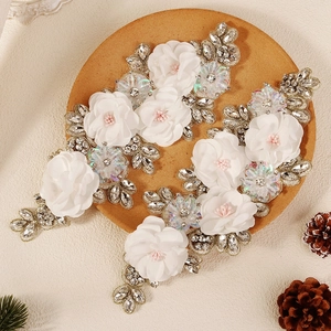 Detail of 3D fabric flower applique with rhinestones and sequins for wedding dress DIY