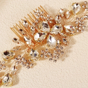 Peigne à cheveux de mariée doré avec strass scintillants et détails artisanaux de luxe