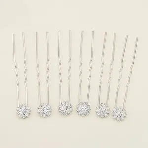 Détail de six épingles à cheveux de mariée argentées avec strass et tiges antidérapantes