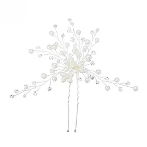 Detailed view of handmade bridal hair clip with white pearls and clear crystal flowers