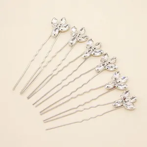 Détail de 6 épingles à cheveux en U argentées avec strass et motif de feuilles