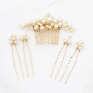 Detail of 5-piece bridal hair set with gold wire weaving and cream faux pearls