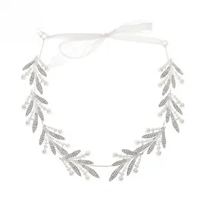 Silver bridal headband with rhinestone leaves and pearls on white chiffon ribbons