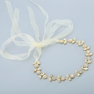 Serre-tête de mariée élégant avec cristaux et ruban en organza finition dorée