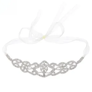 Detailed view of bridal headband with silver rhinestones and white organza ribbon ties