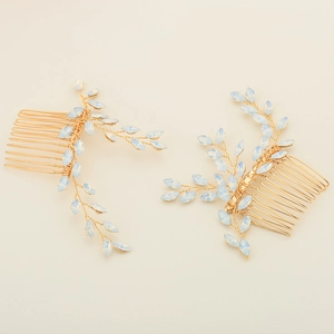 Elegant gold bridal hair comb set with blue marquise rhinestones and leaf motif decoration