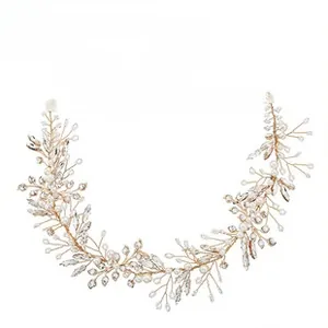 Detail showing handcrafted bridal hair vine with pearls and crystals on gold wire