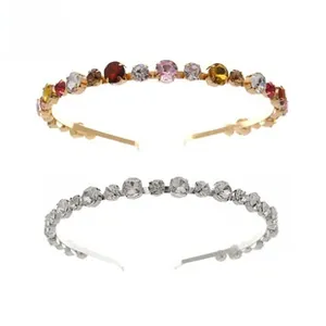 Detailed view of handmade beaded floral headbands with colorful rhinestones on metal