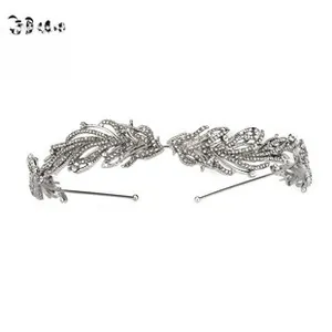 Detail of silver leaf headband with shimmering rhinestones and intricate crystal textures