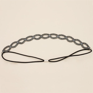 Handmade rhinestone bridal headband with wave pattern and elastic strap for weddings