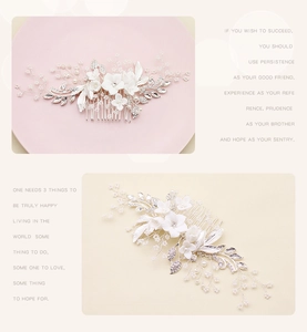 Detail shot of handmade white ceramic flowers and pearls on a silver bridal hair comb