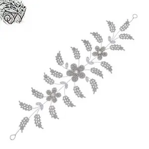 Detailed view of silver crystal sunflower headband with vintage floral rhinestones