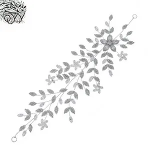 Detail of silver floral bridal hair vine with crystal leaves and flexible alloy structure