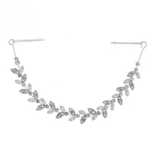 Detail of silver leaf headband featuring sparkling marquise-cut crystal rhinestones