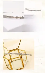 Detail of silver rhinestone headband featuring handmade geometric diamond mesh design
