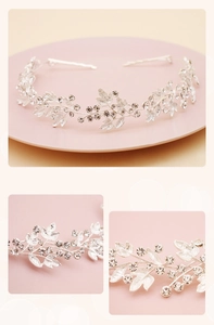 Close-up of silver leaf bridal headband with sparkling crystals and metal wire weave