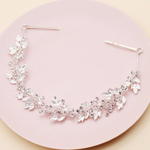 Elegant silver bridal headband with crystal leaf vines and hair clips for wedding party